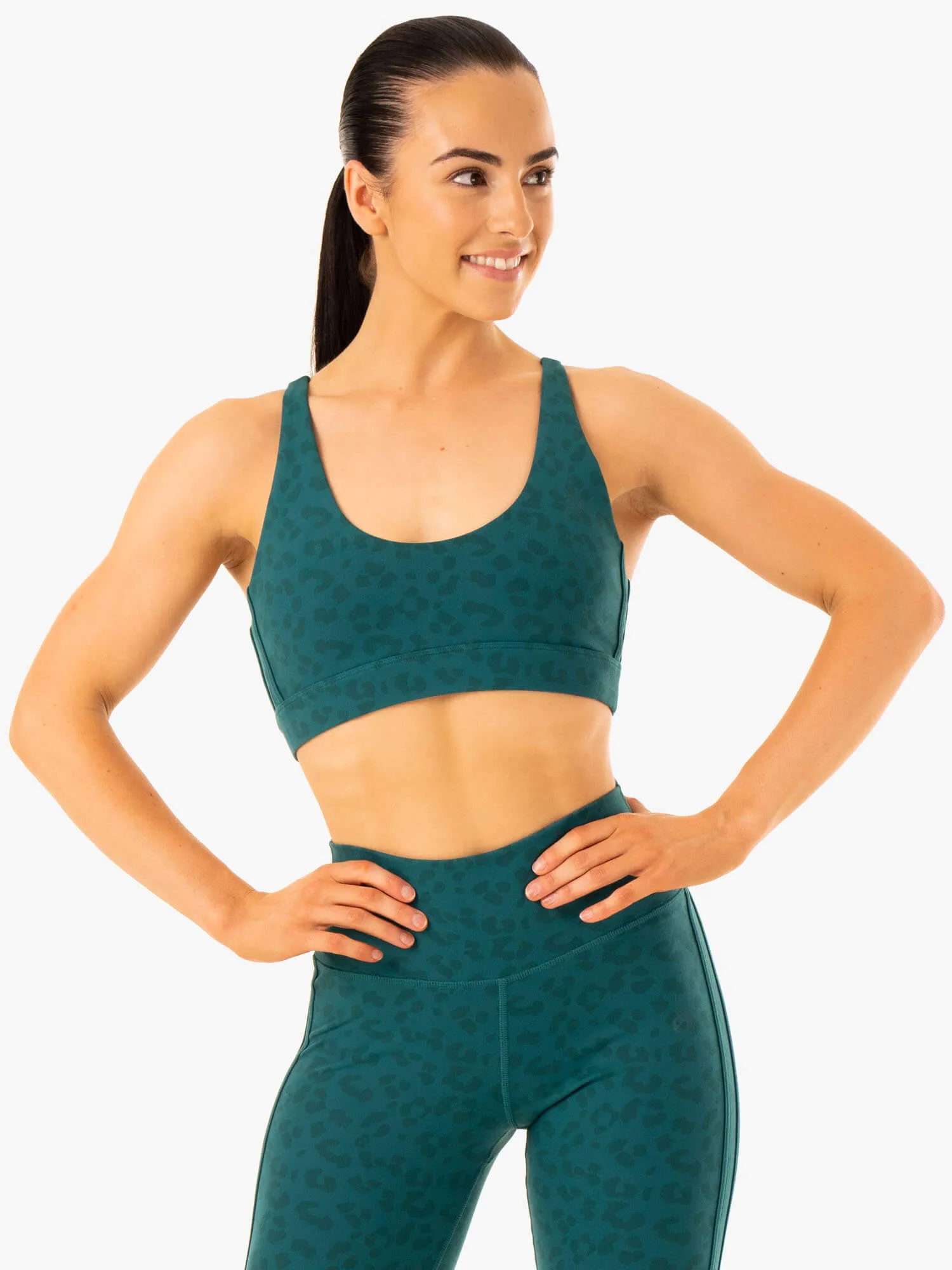 Coordinate with other items seams Evolution Sports Bra - Teal Leopard