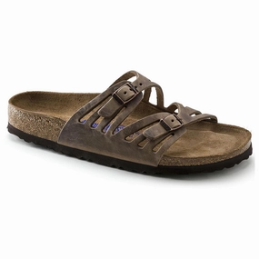 Birkenstock Granada Soft Footbed Tobacco running in a tide pool area shoes