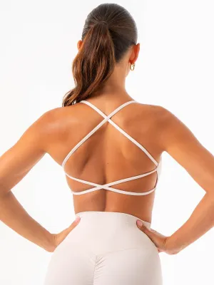 Athletes in training Strapless NKD Embody Sports Crop - Bone