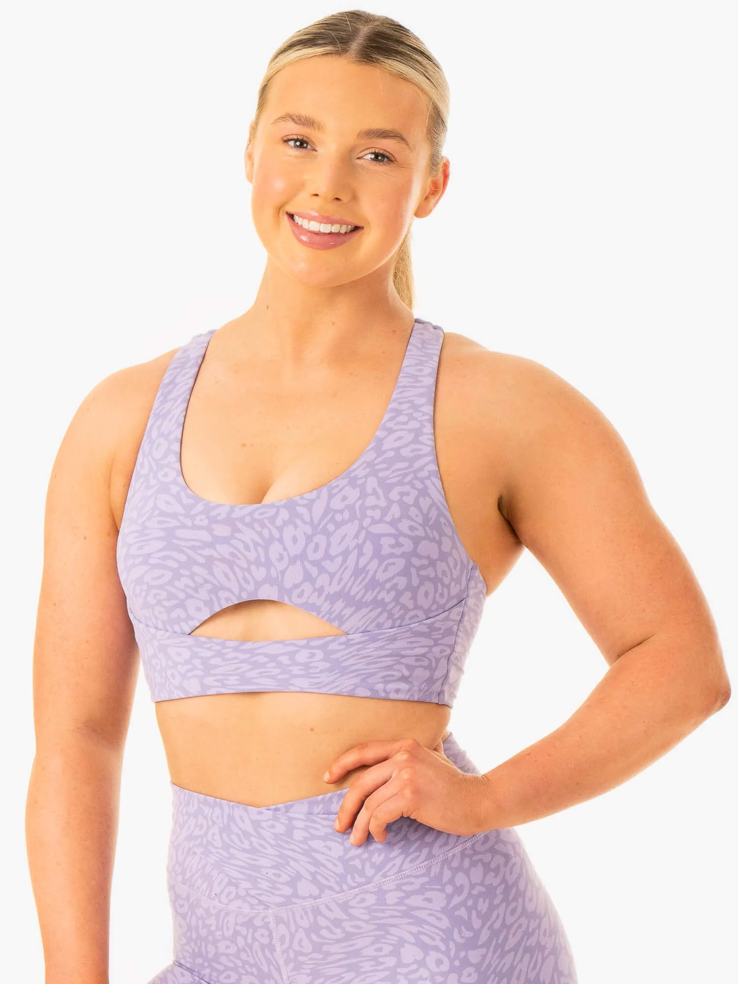 Supportive Seamless Coordinate with other items seams Rotation Sports Bra - Iris Leopard