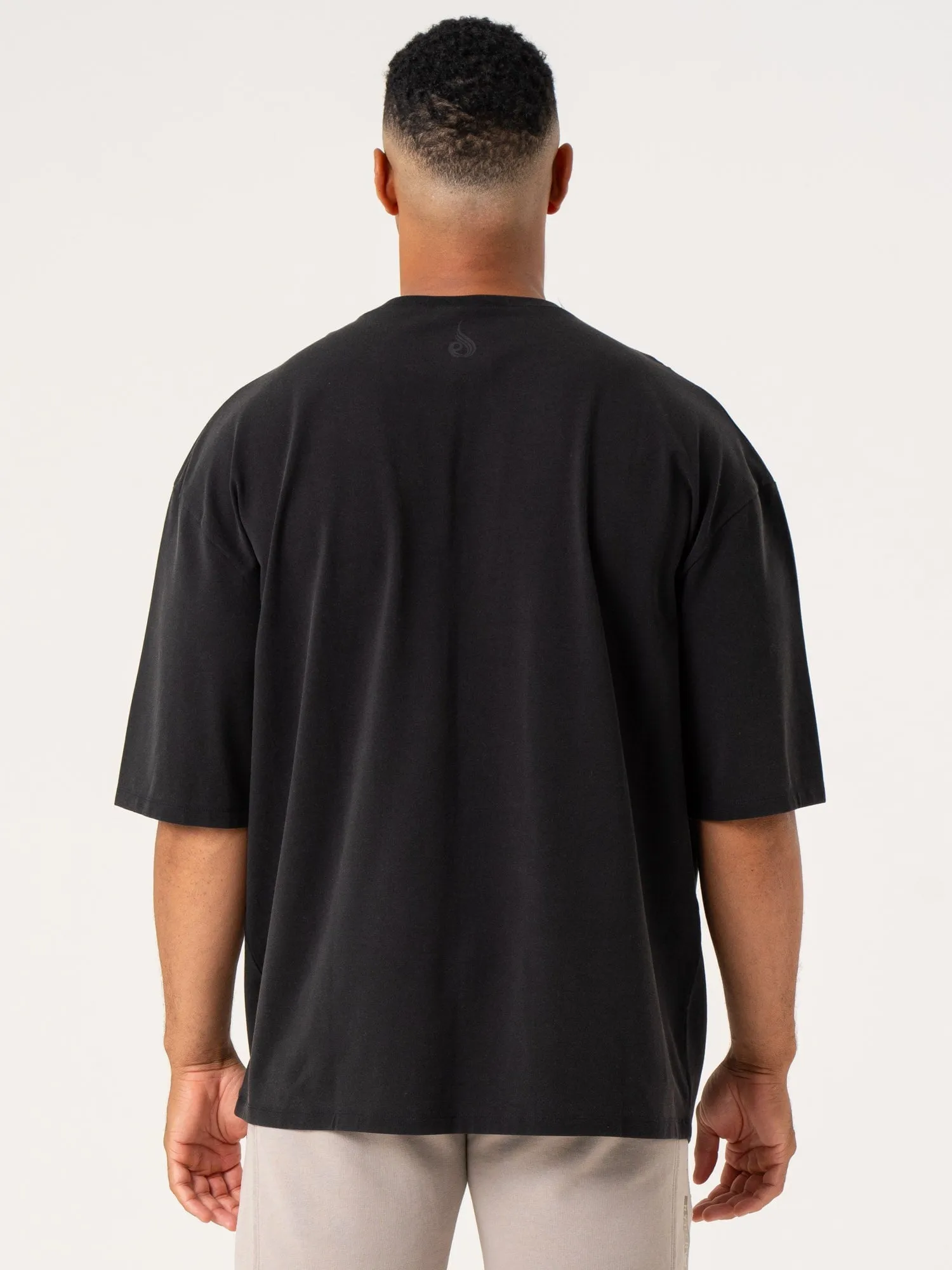 Quick Movement Wear Outdoor Essentials Sustainable Manufacturing Pursuit Oversized T-Shirt - Black Stonewash