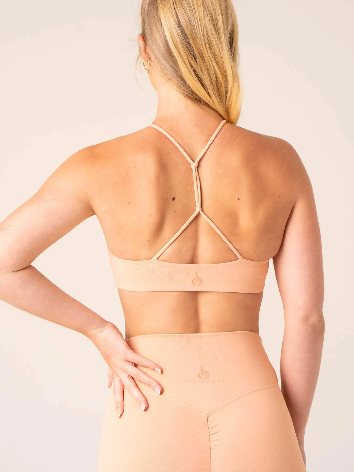 Unstoppable Sports Bra - Peach Airflow channels